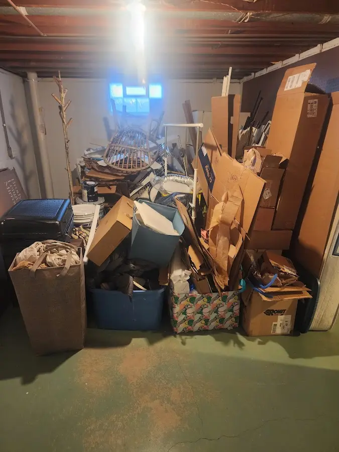 Roll-off dumpster container at job site for 4 Yard Dumpster Rental in Homer